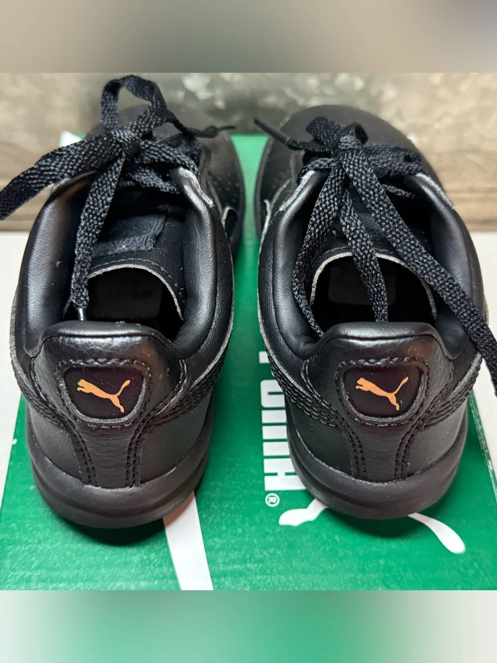 Puma Kids Black Low-Top Lace Sneakers with Gold Logo